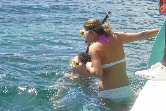 Tobago Buccoo Reef Glass Bottom Boat Cruise and Island Sightseeing Tour - Boarding the glass-bottom boat for Buccoo Reef